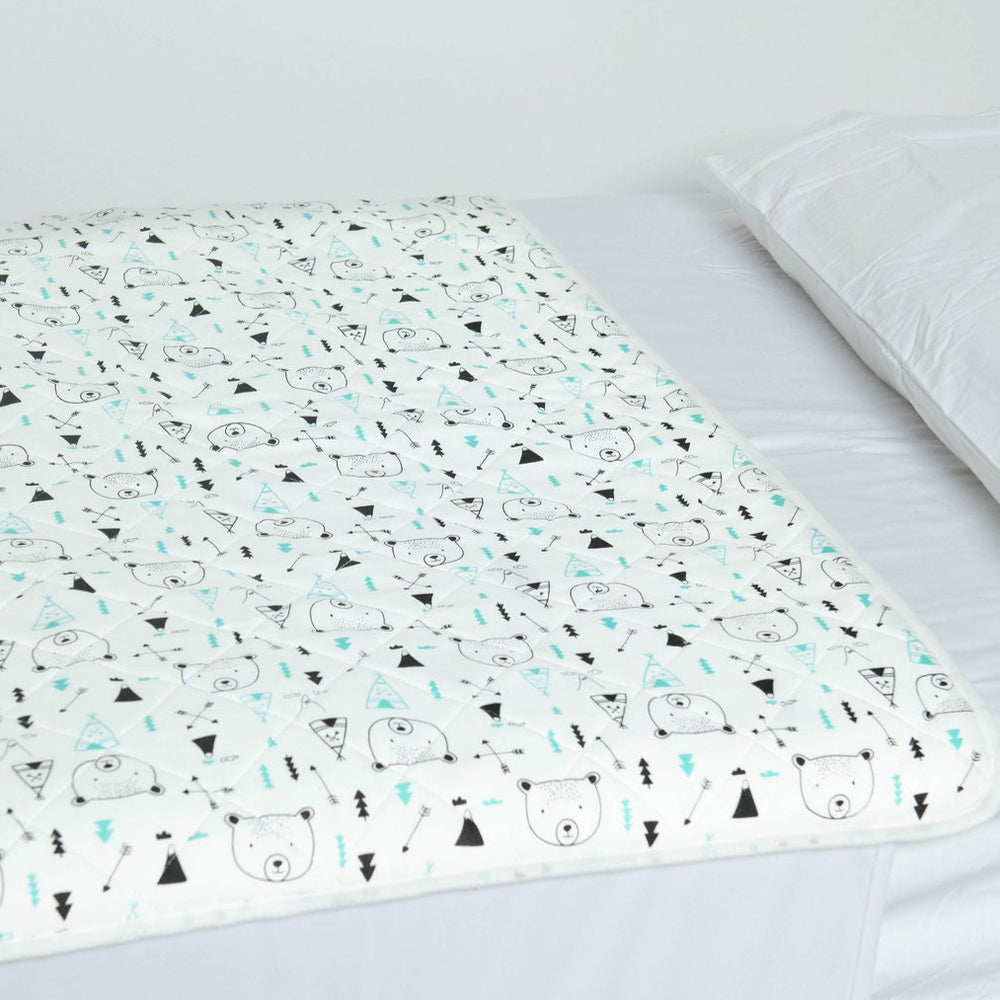 
                      
                        Close up of the Bear Hunt pattern on a Bed Mat that is used for bed wetting or gastro outbreaks. 
                      
                    