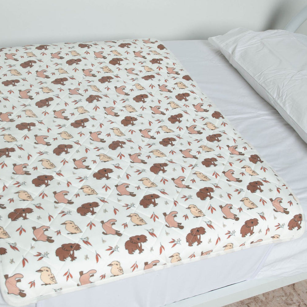 Close up of the Bushland Buddies pattern on a Bed Mat that is used for bed wetting or gastro outbreaks. 