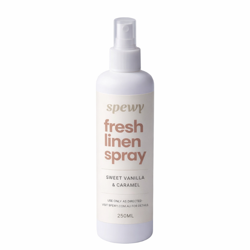 Spewy fresh linen spray bottle on a white background