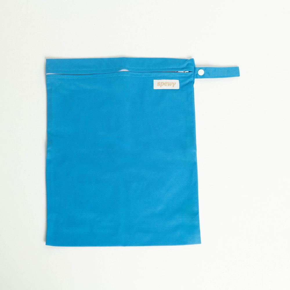 
                      
                        Blue laundry bag with a white zipper on a light gray background
                      
                    
