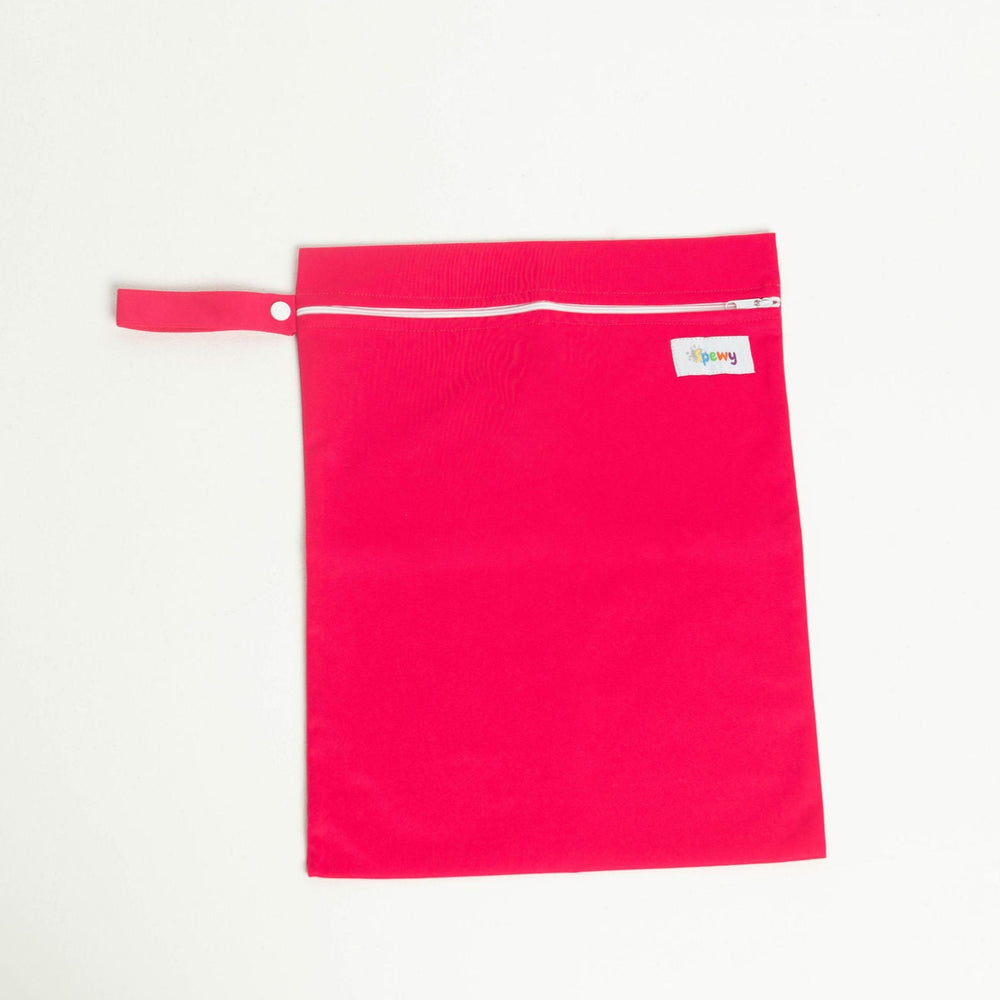 
                      
                        Pink laundry bag with a white zipper on a light gray background
                      
                    