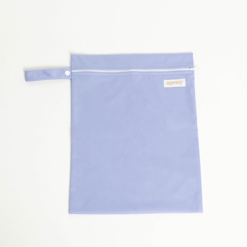 
                      
                        Purple laundry bag with a white zipper on a light gray background
                      
                    